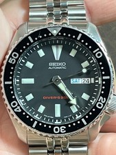Seiko SKX173 with jubilee bracelet original strap and new oem strap