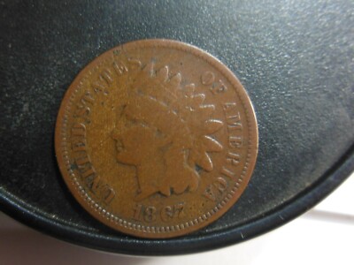 1867  1C,  CLASHED DIE BOTH SIDES, WREATH IN FOREHEAD, FEATHERS ON REV RIGHT   
