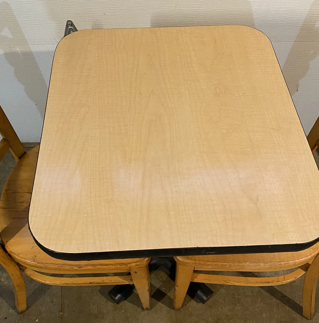 small cafe table with 2 chairs