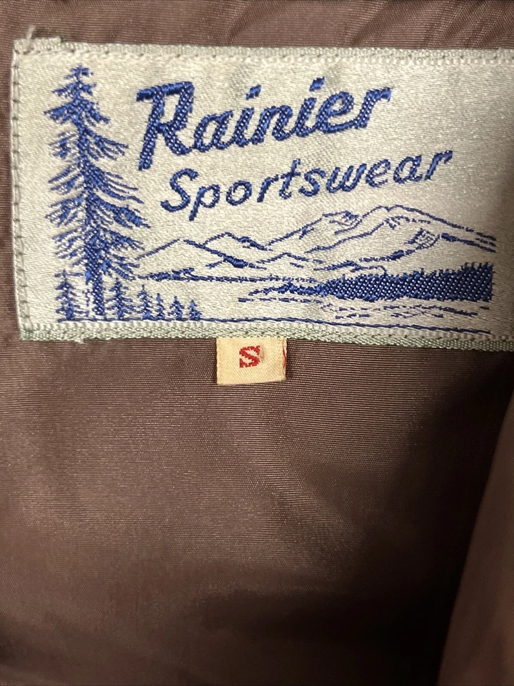 Chaleco aislante de plumón marrón vintage años 80 Rainier ropa deportiva para hombre pequeño acolchado Foto 4 de 4