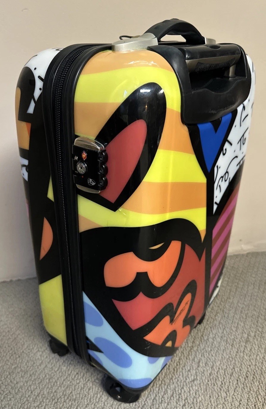 Heys A New Day 21" Transparent Carry On Luggage Spinner Romero Britto Hard Shell