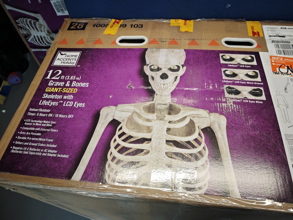 12ft giant skeleton with animated LCD eyes,torso light kit. NIB home