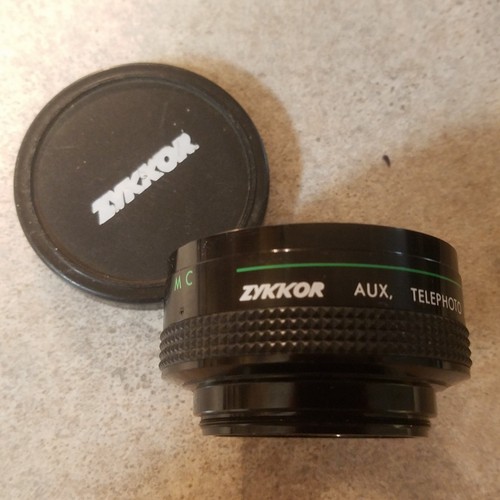 Zykkor Aux Telephoto Lens Auto Focus 6 ft to Inf. AFCOR with cap