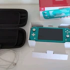 Nintendo Switch Lite Turquoise Handheld Console 32GB Wi‑Fi USB-C In Box