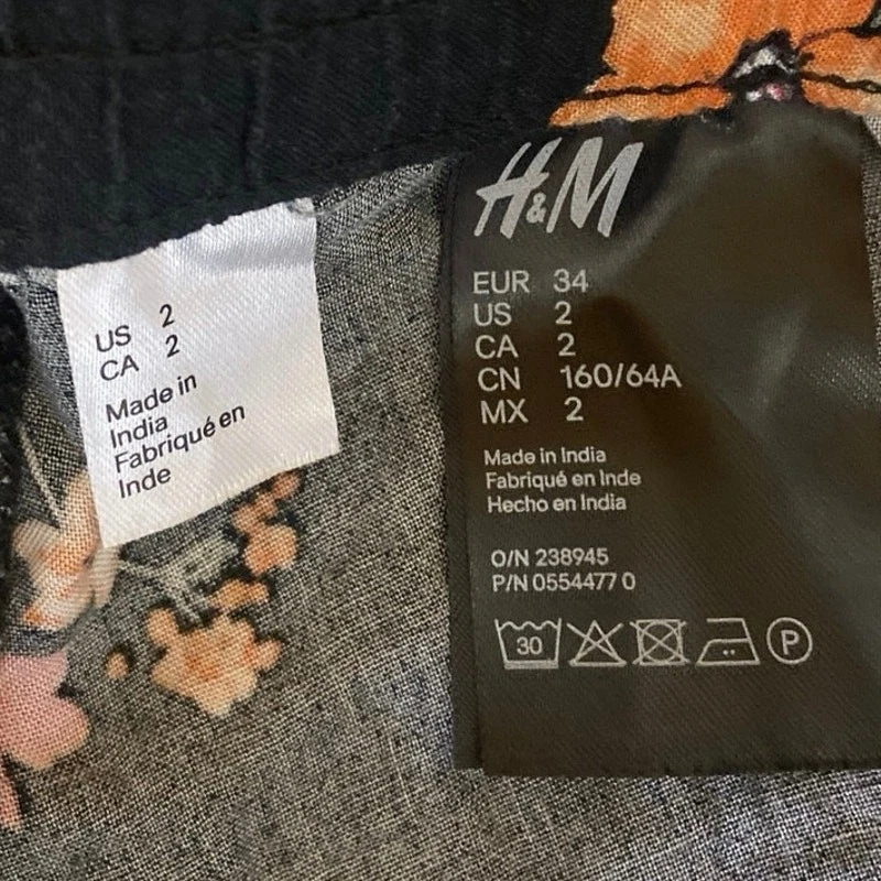 Pantalón al tobillo H&M negro estampado floral cintura elástica bolsillos talla 2 Foto 4 de 4