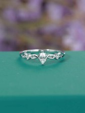 0.6ct Marquise Cut Simulated Diamond Ring White Gold Plated Trilogy Solitaire