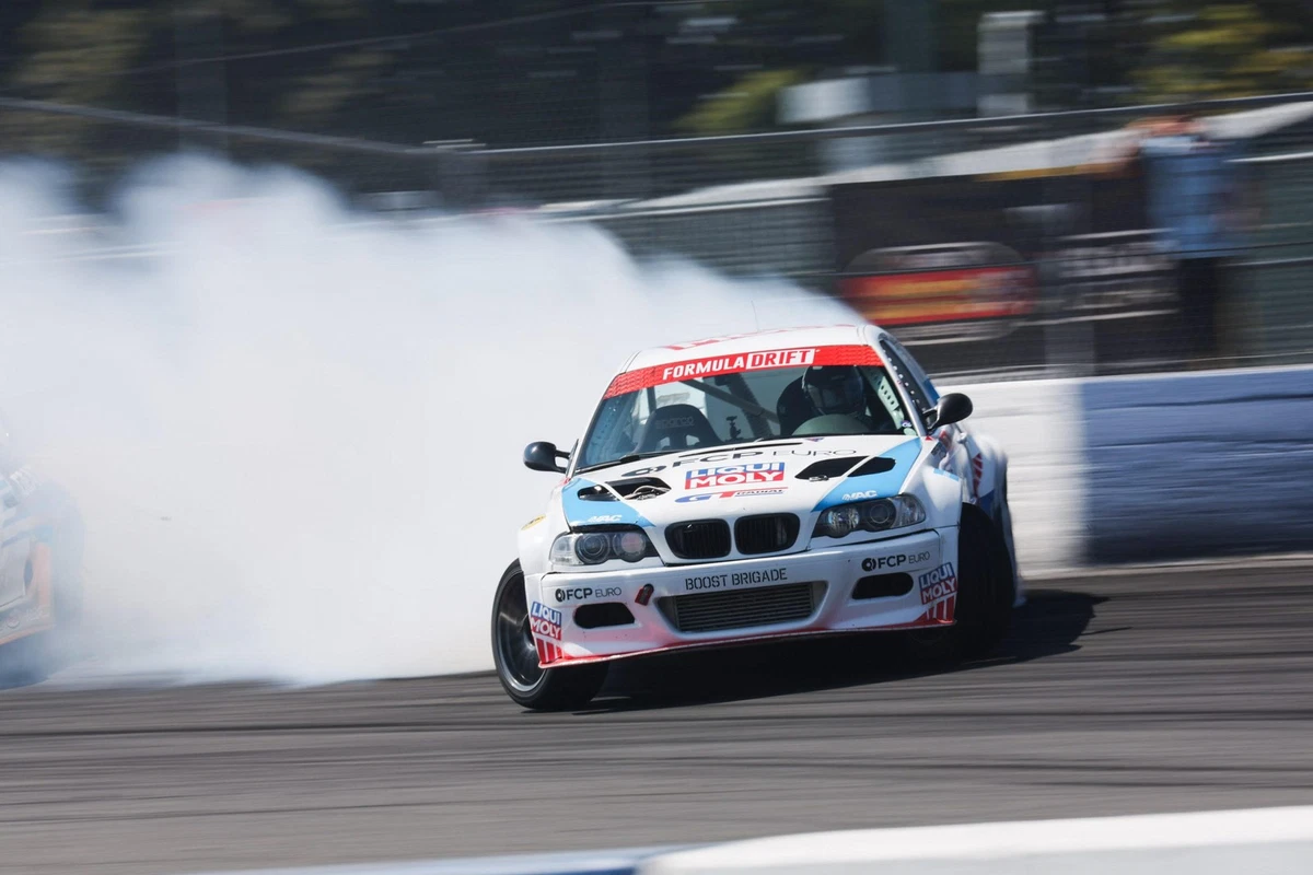 2013 Formula Drift Champion Michael Essa drifting on a racetrack