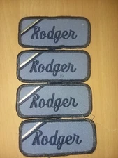 "Rodger" (4) Cloth Uniform Embroidered Name Tags Blue  Letters & Background. #17