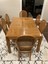 thomasville solid oak table, 2 leaves, 6 cane back chairs, custom pads euc