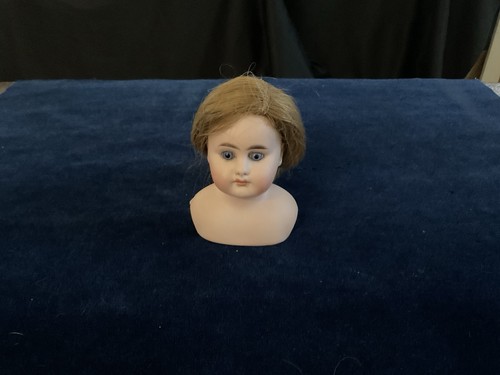 Antique Bisque Doll Head Closed Mouth Blue Eyes