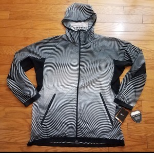 black nike jacket with white stripe