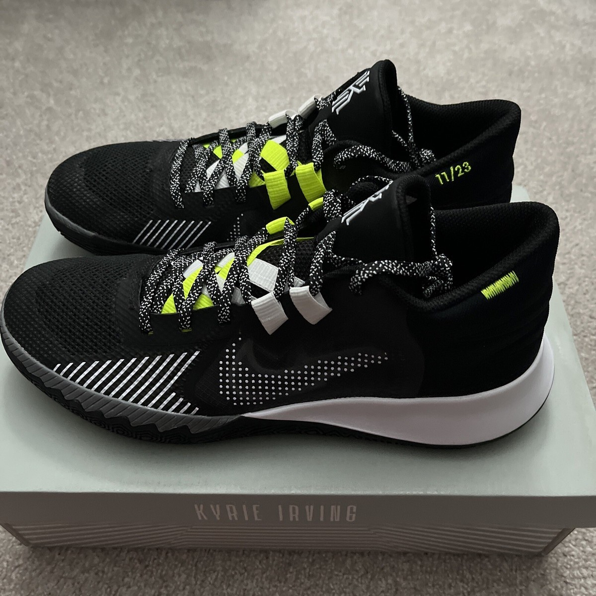 kyrie shoes black and green