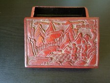 A Chinese Cinabar Box Decorated With People Under the Pine Trees