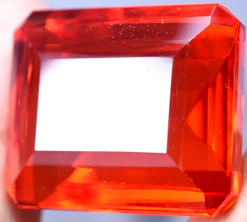 Lab created 128.05 Ct Splendid Orange Topaz GGL Certified Emerald Cut Gemstone Foto 4 de 4