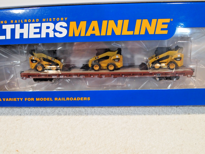 #ad #ad B.N.S.F. 60ft. PULLMAN STANDARD FLAT CAR WITH 3 ATTACHED quot;CATquot;272C SKID STEERS $60.00