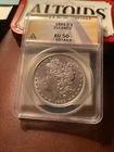 1889 O Morgan silver dollar AU 50 Details Cleaned GreySheet price $ 110 (7)