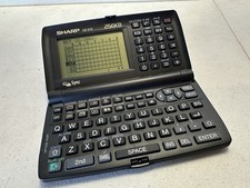 Sharp Wizard OZ-570 256kb Electronic Organizer Vintage Tested