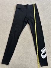 black Nike Sportswear Leggings feature a high-rise design