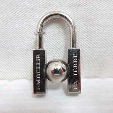 Hermes 2001 Limited Edition Beauty of Unknown Earth Padlock Charm Silver