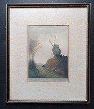 old coloured print of a windmill signed
