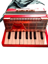 accordéon eminee original un peu usé mais fonctionne toujours !