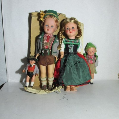 BAVARIAN BOY AND GIRL CELLULOID, GURU, PLUS TWO SMALL DOLLS