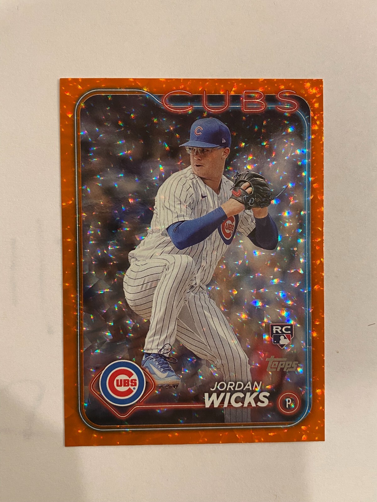 2024 Topps Series 2 - Orange Foil #613 Jordan Wicks 004/299 (RC)