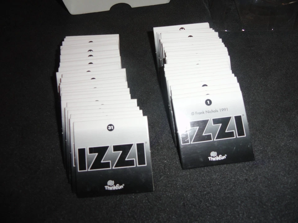 2003 ThinkFun - IZZI The Game w/ Almost A Zillion Solutions Complete in Box - Image 4 of 4