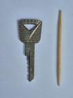 Vintage FORD MOTOR CHROME BRASS V-LOGO OEM KEY , CUT. 🇺🇸 USA — photo 1