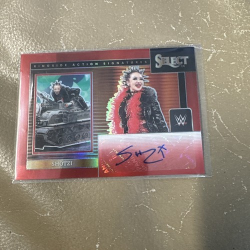 2024 Panini WWE Select Shotzi Ringside Action Signatures Red Prizm /99 RA-SHZ