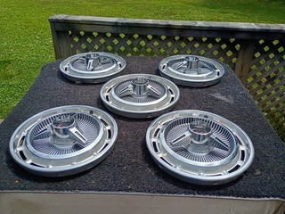 Vintage Chevy SS 14" spinner hubcaps (set of 5)