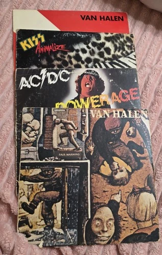 Classic 1980s rock vinyl record lot featuring Van Halen, AC/DC, and Kiss