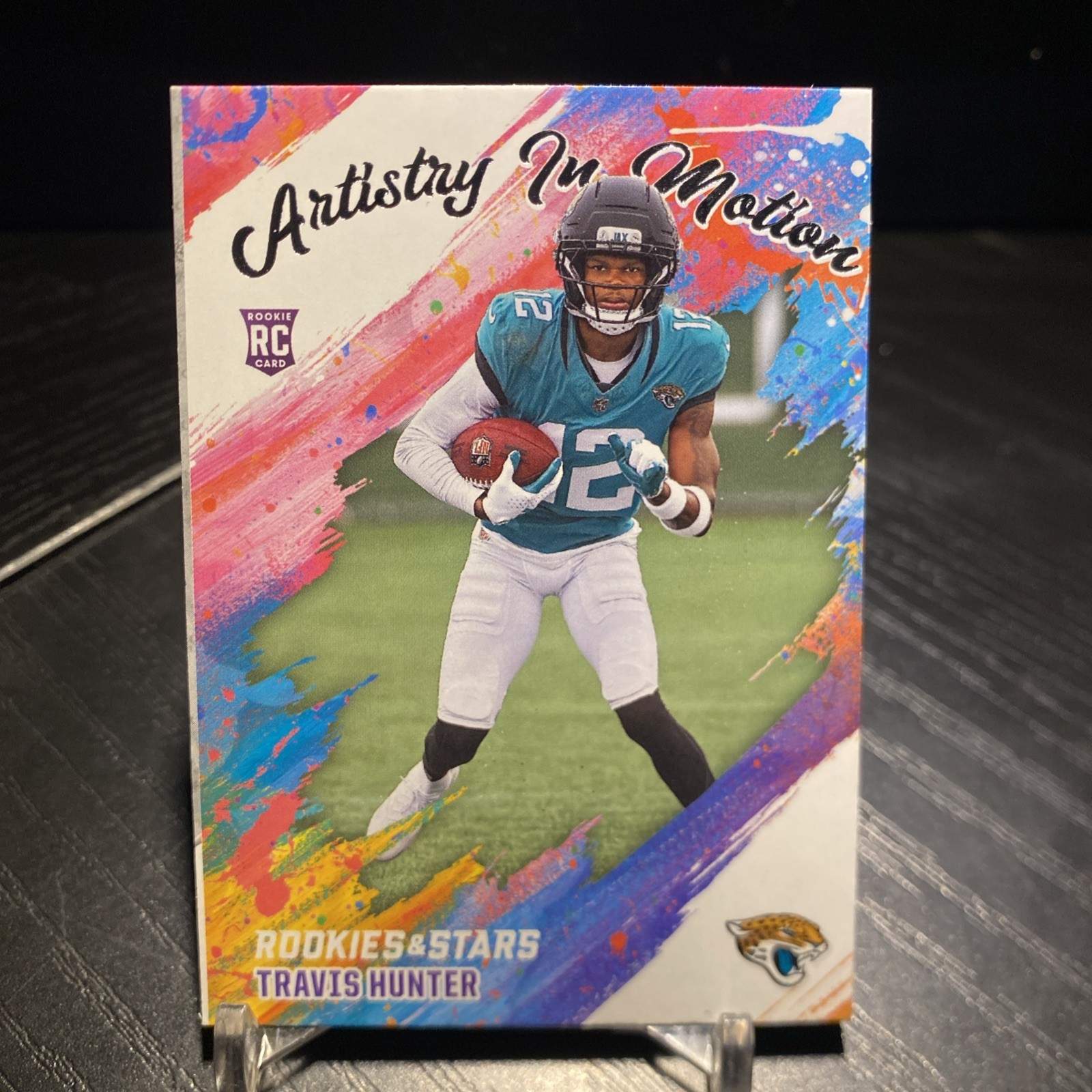 Travis Hunter 2025 Rookies & Stars Artistry in Motion RC #8