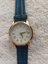 Goldene Damenarmbanduhr, Quarzwerk, mit blauen Armband