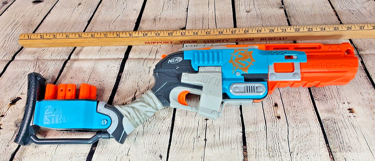 Nerf Zombie Strike SledgeFire Blaster with 3 Shells - Break-Action