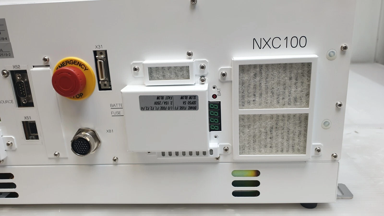 NXC100 front panel with EMERGENCY STOP button, X31 and X81 connectors and status display