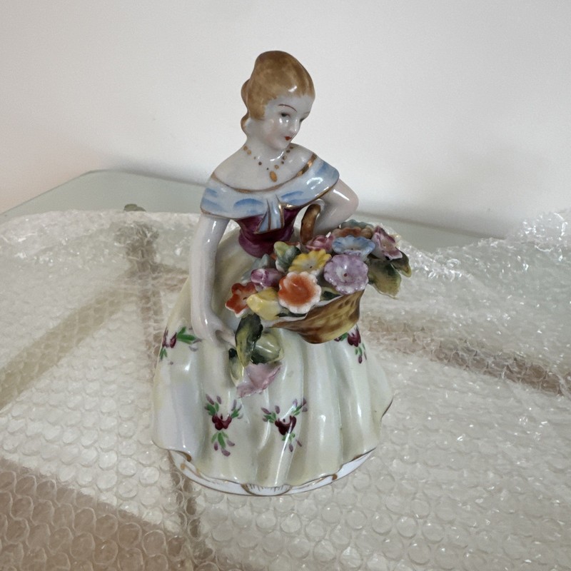 Vtg PAINTED PORCELAIN FIGURINE WOMAN HOLDING A BASKET OF FLOWERS -Occupied JAPAN