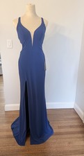 La Femme plunging neckline, open caged back, and a leg slit Prom Dress