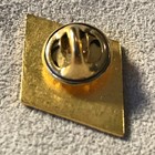 Vintage COMSAT lapel pin featuring "COMSAT" in Blue lettering below the US Flag — photo 2