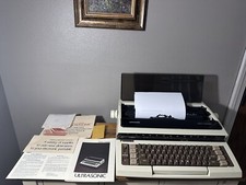 Smith-Corona Ultrasonic Electronic Portable Typewriter USA W/ Case & Manuals thumbnail