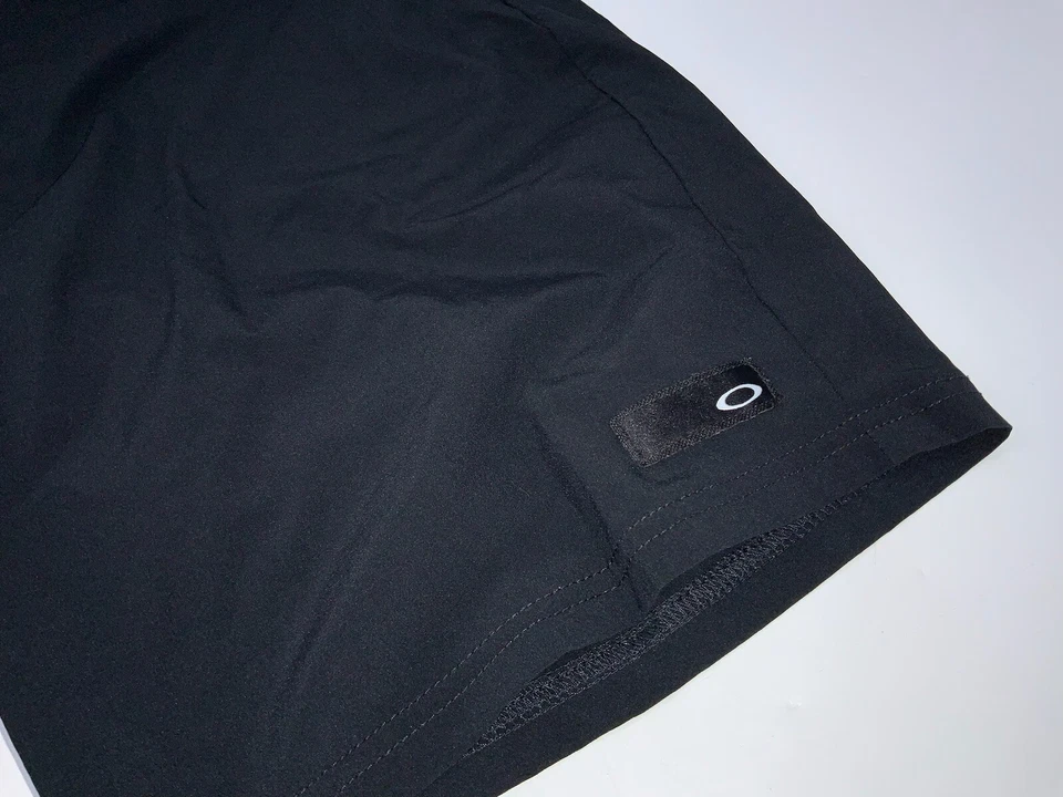 Pantalones cortos de golf Oakley para hombre talla 36 Frente plano polietileno negro sin defectos YGI H2-372 Foto 3 de 4
