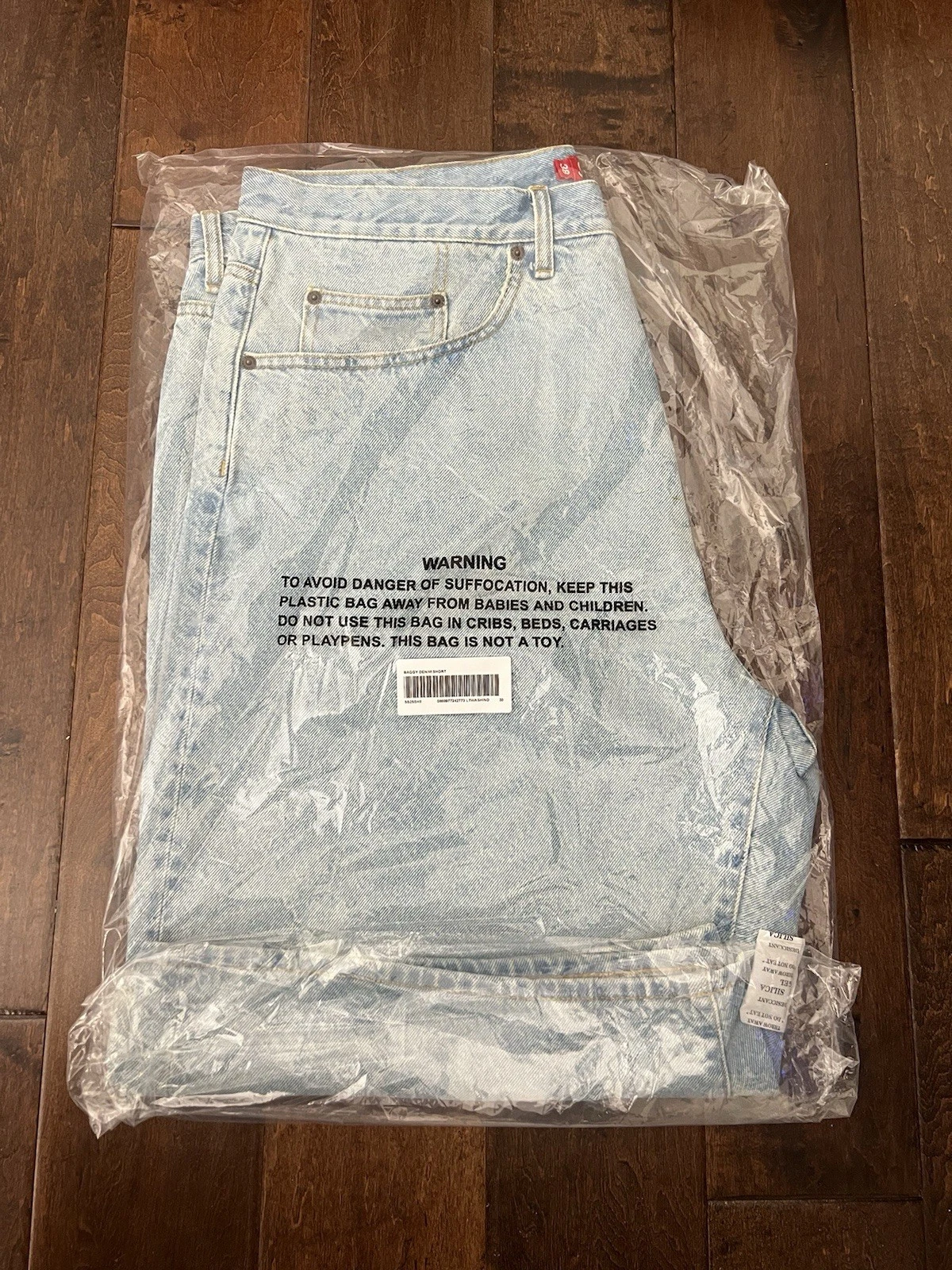 Short denim baggy Supreme SS25 bleu indigo lavé clair taille 38 neuf EN MAIN