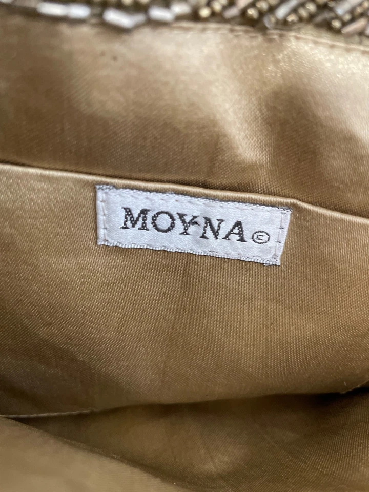 Bolso sin asas Moyna con cuentas tono dorado patrón de remolino dorado frente a presión forro satinado Foto 3 de 4