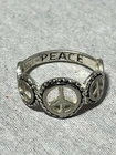 Sterling Silver PEACE symbol Ring size 7.50 marked PEACE inside and .925 VINTAGE