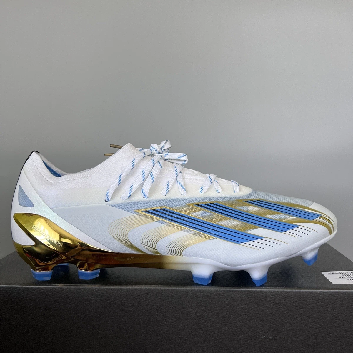 Blue and gold adidas cleats hotsell