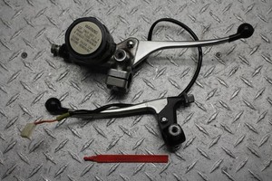 1974 SUZUKI GT550 FRONT BRAKE MASTER CYLINDER & CLUTCH PERCH W/ LEVERS