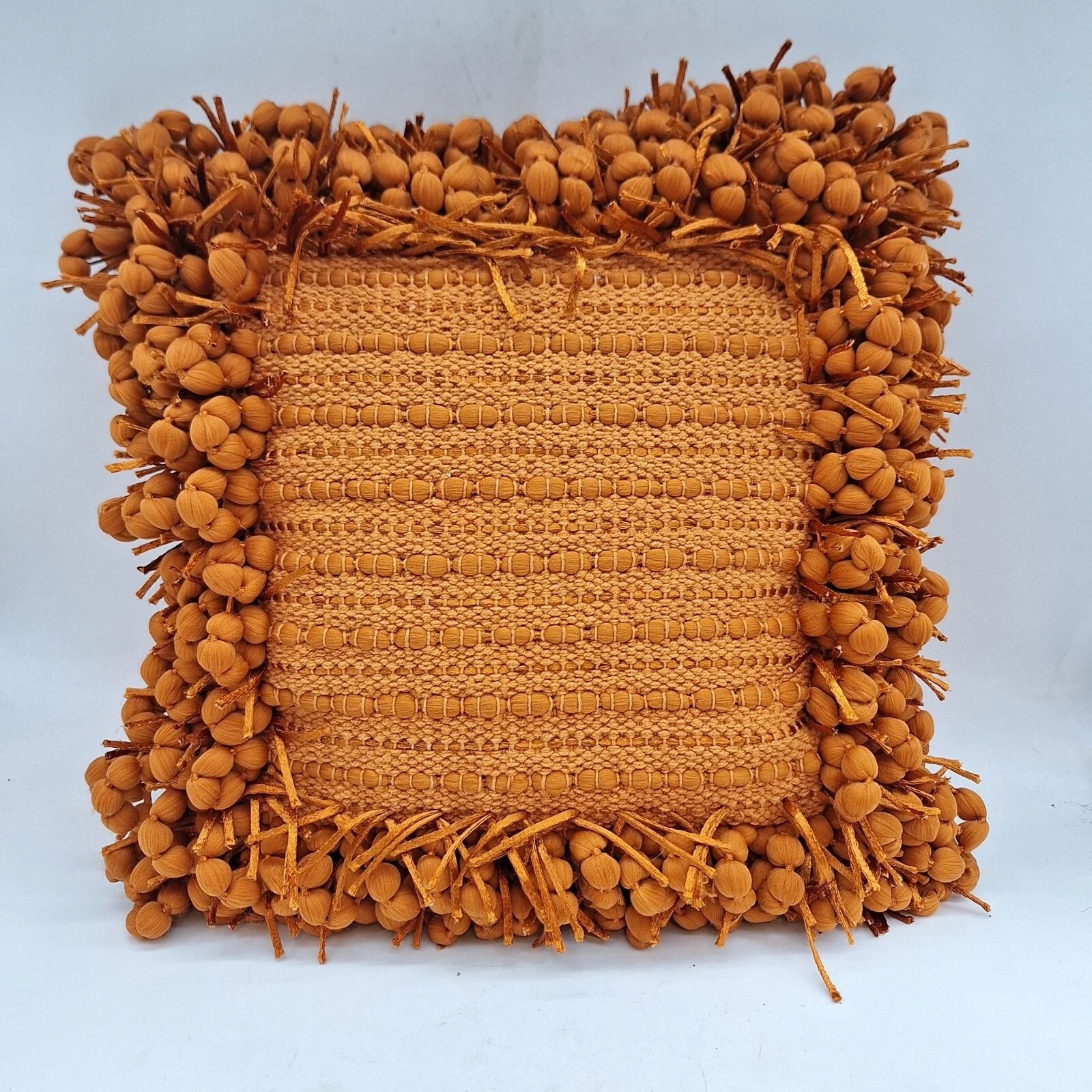 Designer throw pillow burnt orange linen pompom fringe frame woven textured down