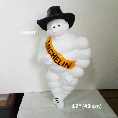 Statua mascotte Michelin uomo moto moto moto bici