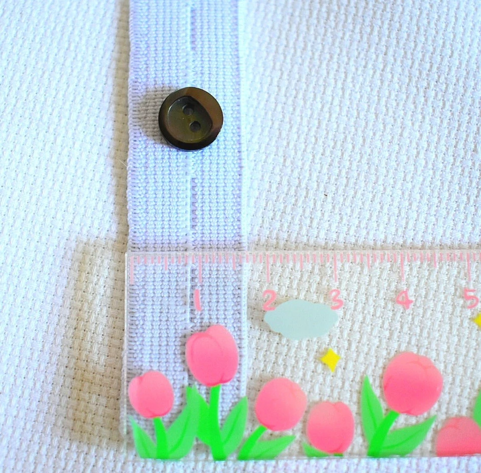 1 M DI NASTRO BI ELASTICO CON ASOLE PER BOTTONI ALTEZZA 18mm ⬜️ - Immagine 2 di 4