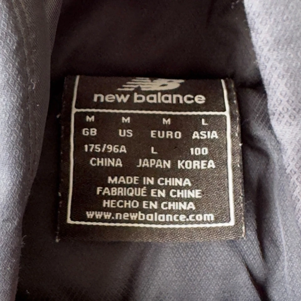 Chaqueta acolchada larga New Balance negra para mujer mediana (M) Foto 3 de 4